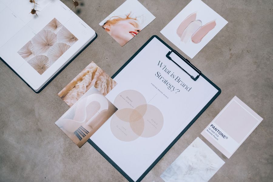 Brand identity flat lay with stationery and logo concepts